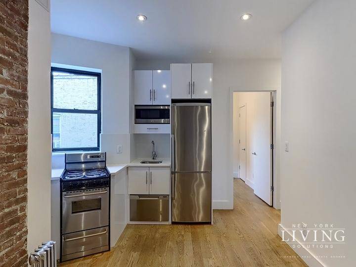 Stunning newly renovated 3 bedroom with in unit washer dryer in the Lower East Side.