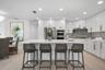Kitchen with Breakfast bar island and stainless appliances