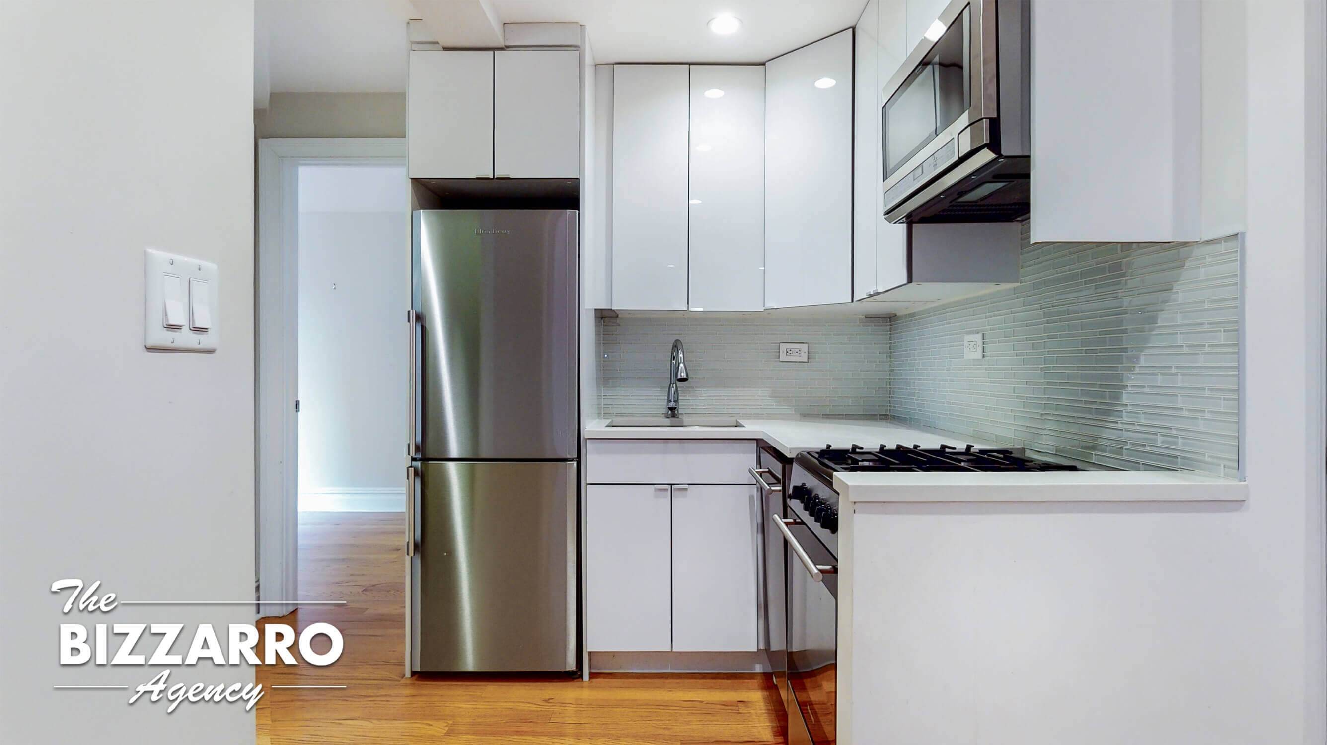 Renovated INVESTOR FRIENDLY CONDO Bennett Sixty Nine This modern 1BD 1BA condo features an open layout chef's kitchen with white custom cabinetry, quartz countertops, glass tile backsplash and a suite ...
