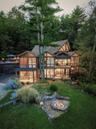 Main house and fire pit from front lawn