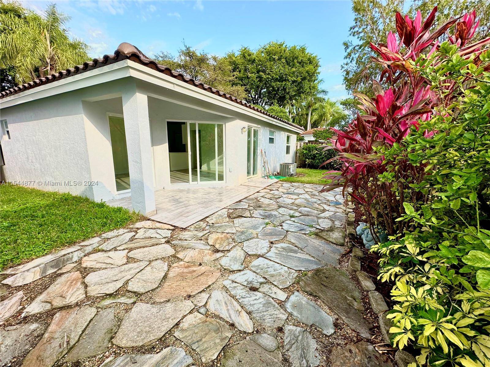 GORGEOUS ONE STORY SINGLE FAMILY HOME COMPLETELY REMODELED IN THE HEART OF DORAL.
