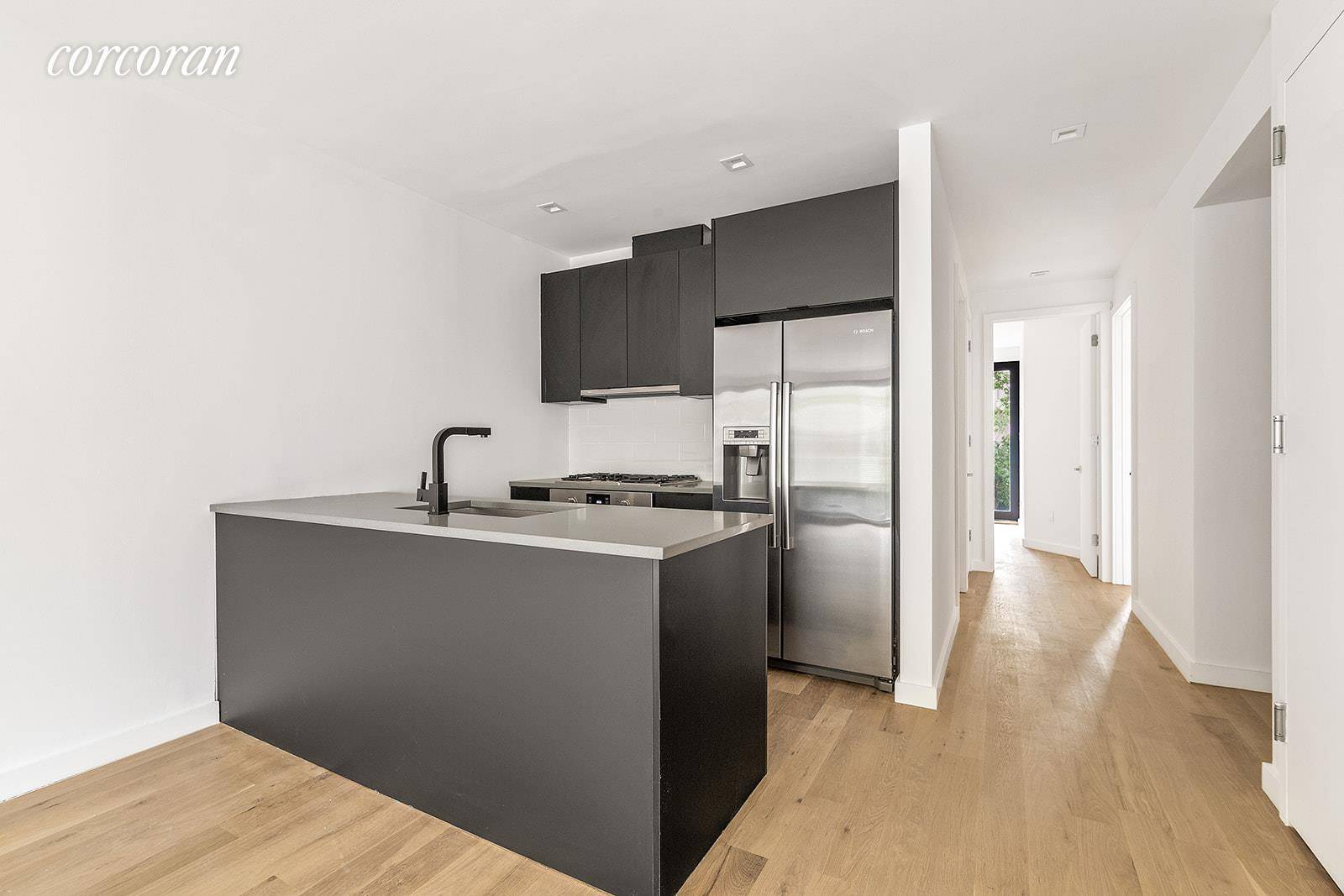 Unit 2 offers three bedrooms and two full baths with an expansive living and dining space, tons of natural light with Southern and Northern exposures and two balconies.