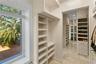 5 closets plus safe room in the Primary Suite