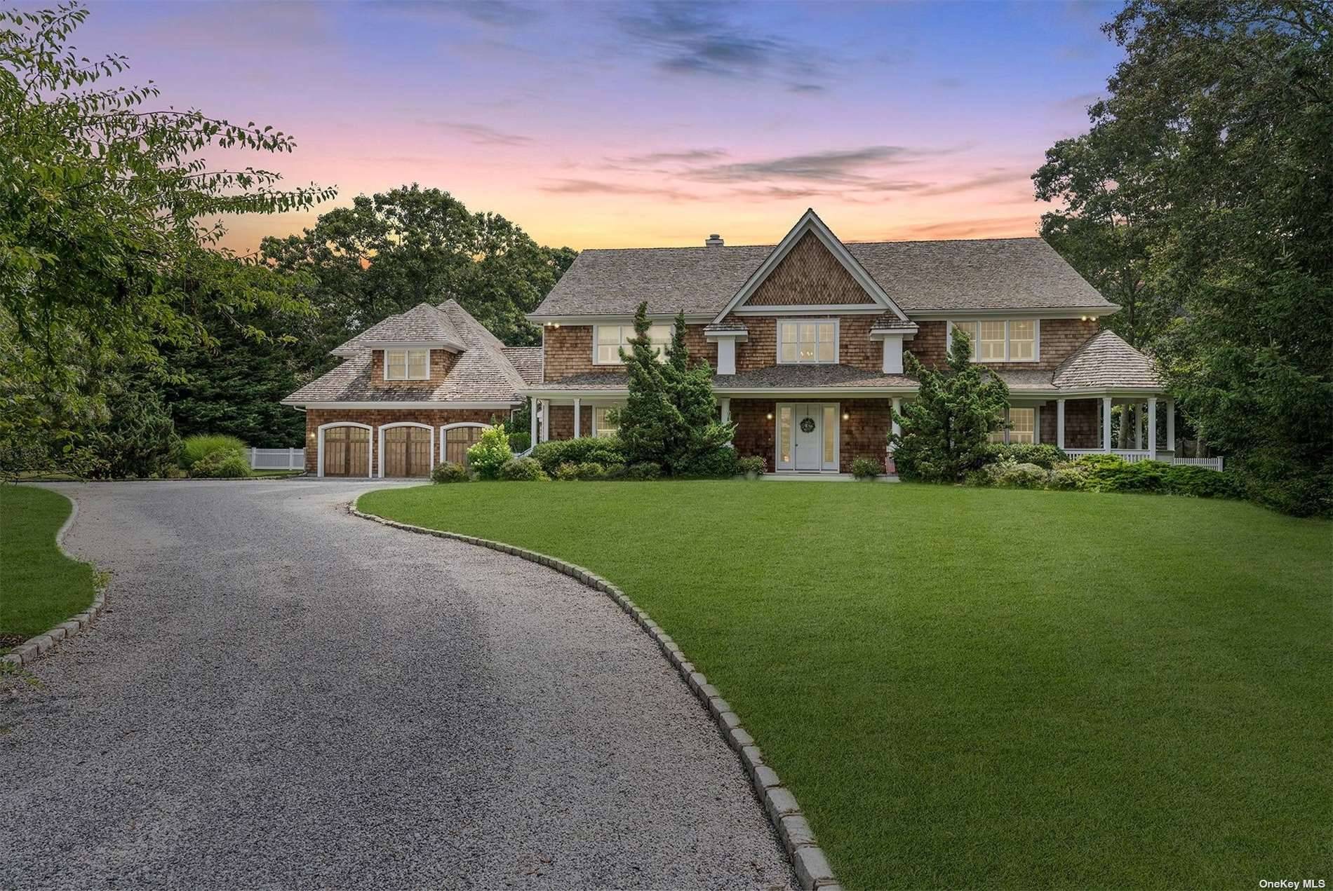 Located in the heart of Quogue South, this stunning generational estate sits on 1.
