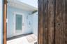 Outside shower with hot and cold water and features a door that goes directly into the Casita half bathroom