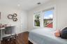 Another bedroom with walk-in closet.