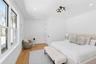 Bedroom with light wood-style flooring and recessed lighting