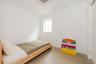 Bedroom with baseboards