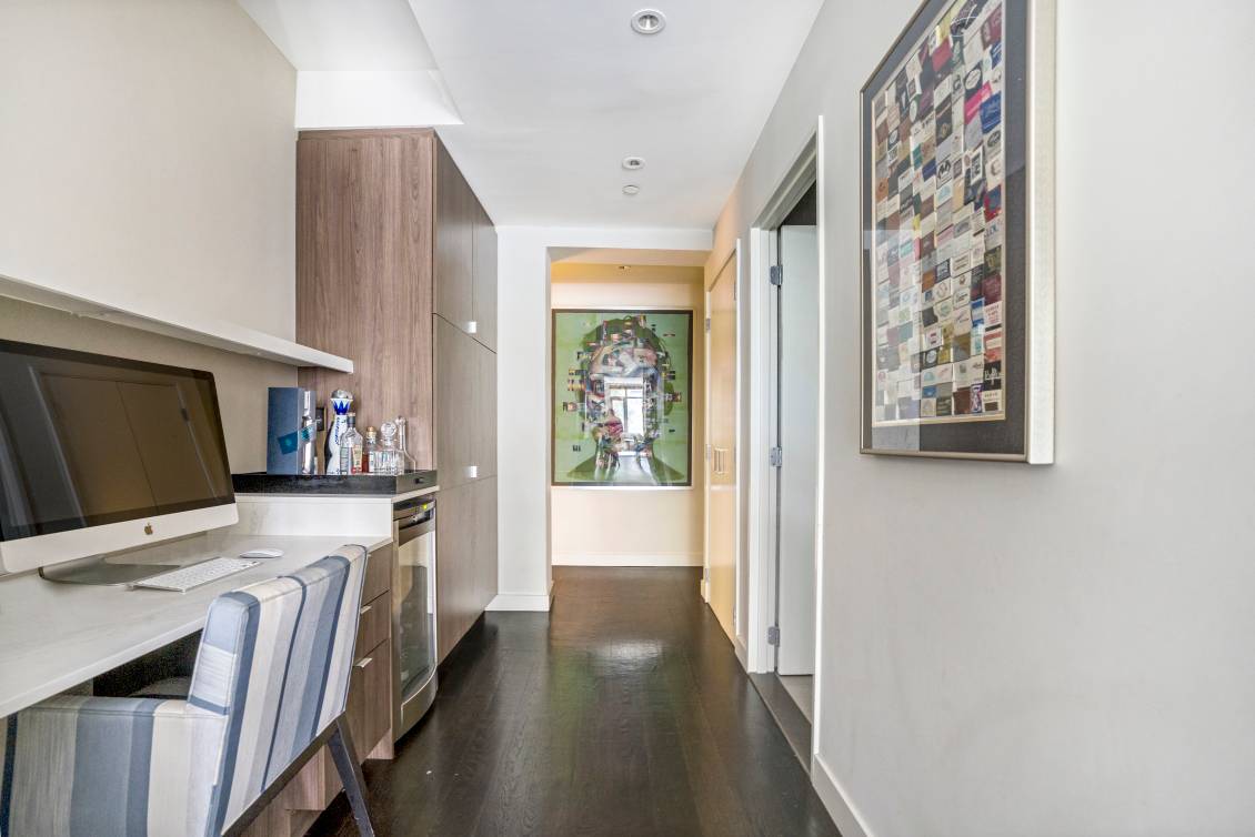 Bask in expansive sun filled living space and private outdoor space in this beautifully combined three bedroom, two bathroom residence in a full service Murray Hill condominium.