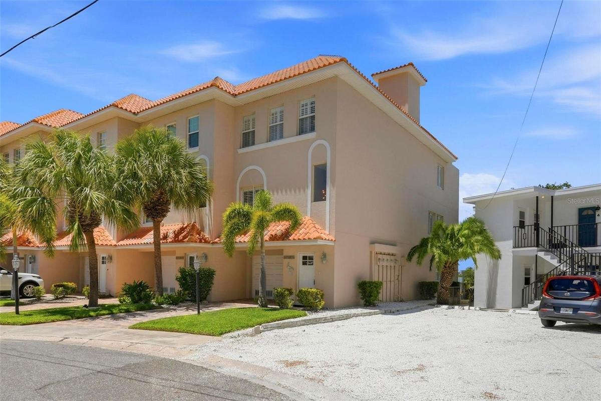 Welcome to this exceptional waterfront corner-unit townhome, offering 3B/3B - three levels with sweeping water views from every floor. It features an
