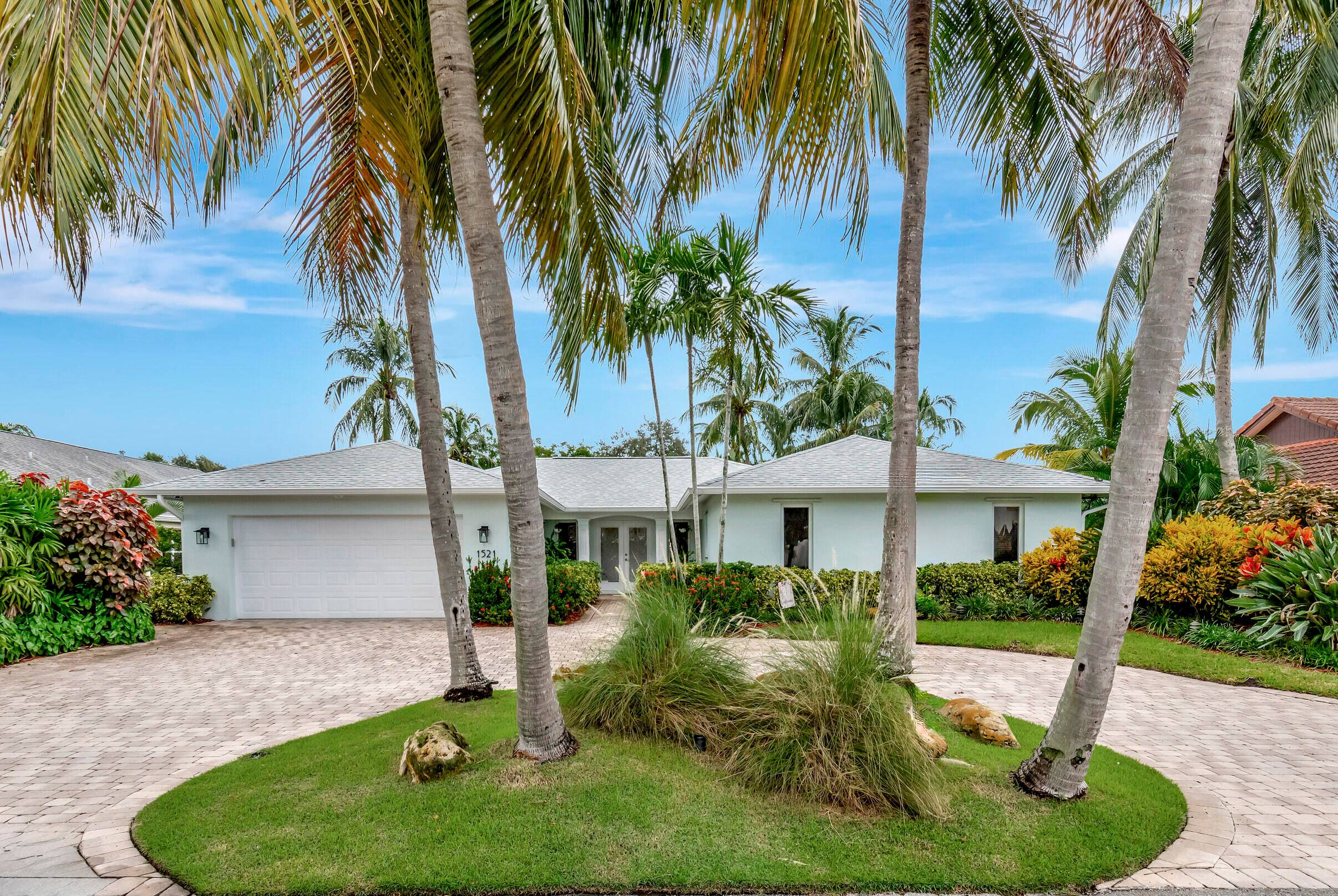 Beautiful and spacious 5 bedroom, 3 and a half bath, 2 car garage home with nearly 2, 800 living sf located in the highly desirable Palm Beach Farms.