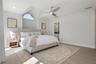 Primary bedroom with ensuite bathroom and outdoor shower