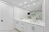 Double Sinks, Enclosed Toilet and Linen Closet