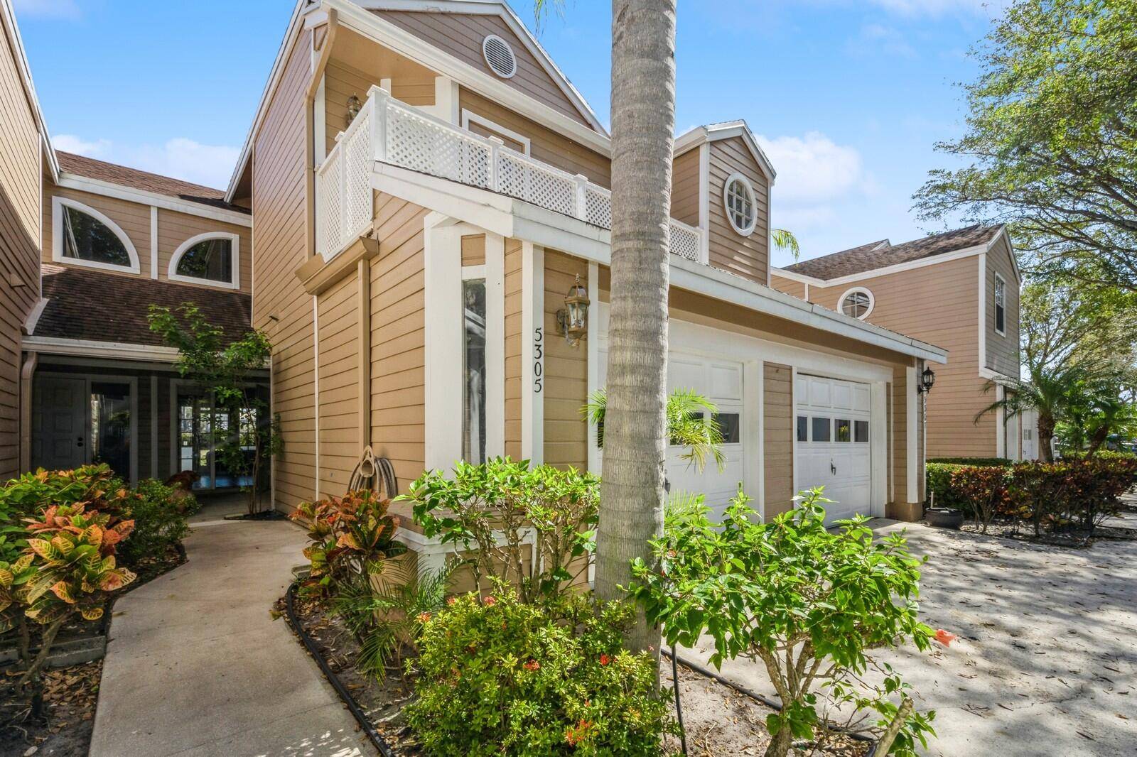 This Fairfield at Boca 2BR 2BA ground floor Carriage House is right on the lake with water views from every room !