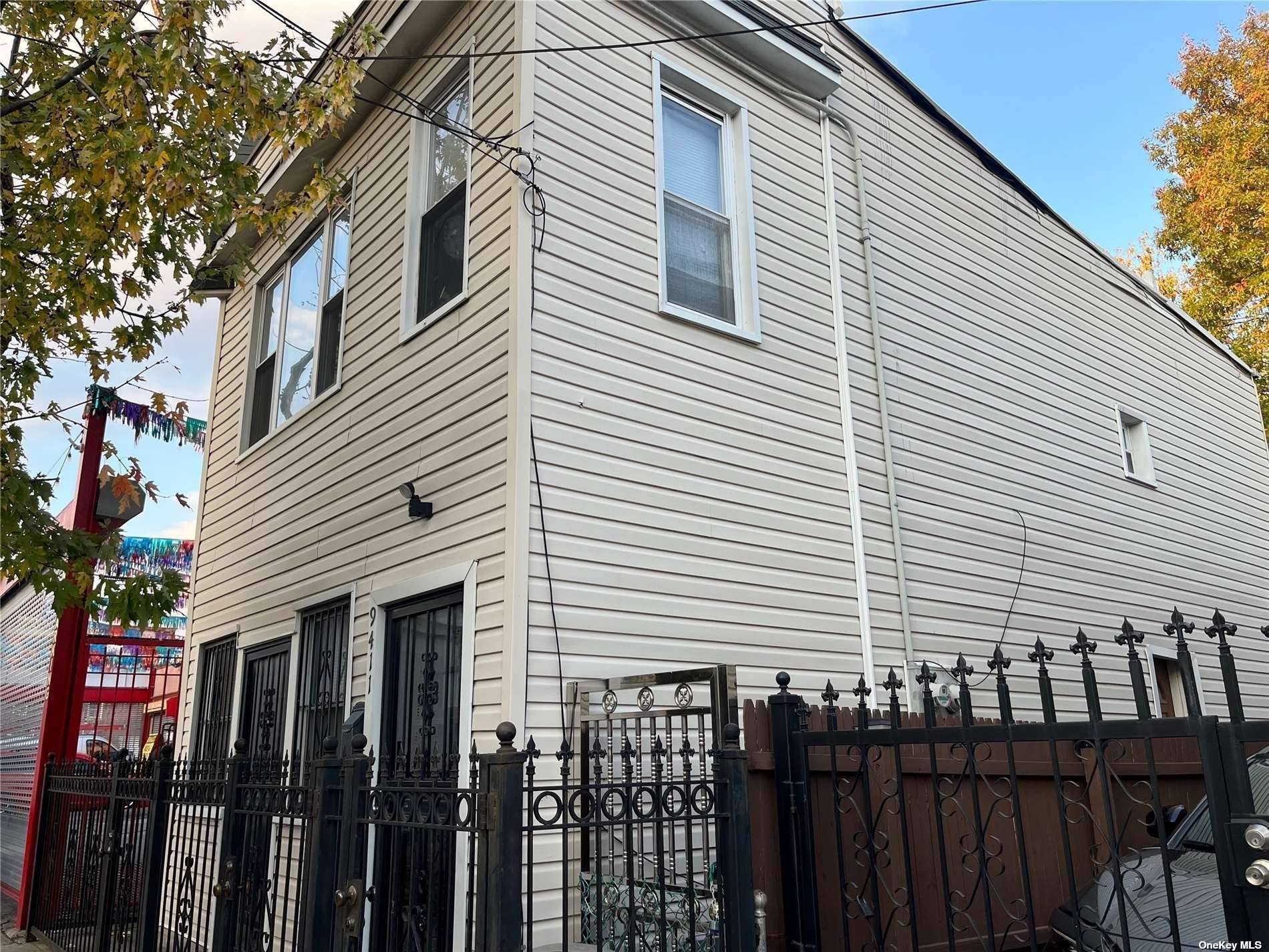 DON'T MISS ! Welcome to this exceptional legal 2 family residence in the heart of Ozone Park a versatile gem.