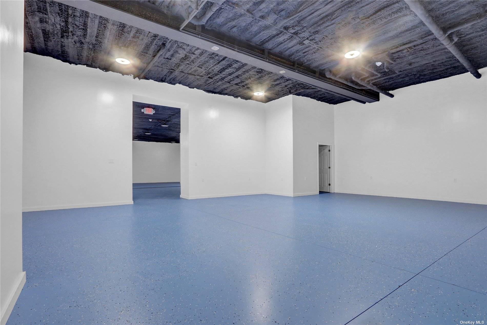 Warehouse space available in New Hyde Park which offers 1400 sqft with 13 foot ceilings, climate control comes with parking space and utilities included in the rent.