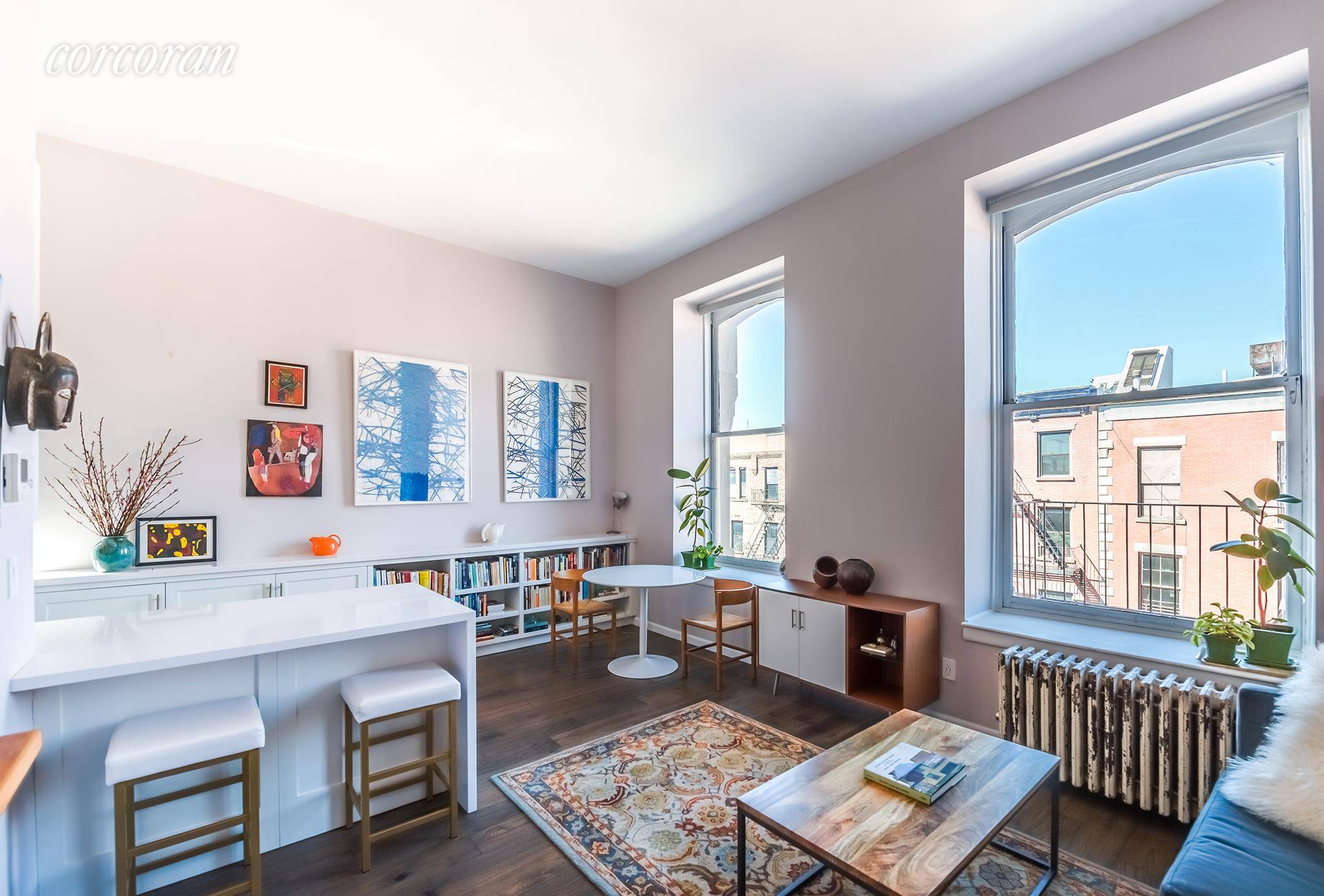 This sun filled, corner one bedroom one bath apartment is perfectly located in a prewar condominium where Cobble Hill blends with Brooklyn Heights.