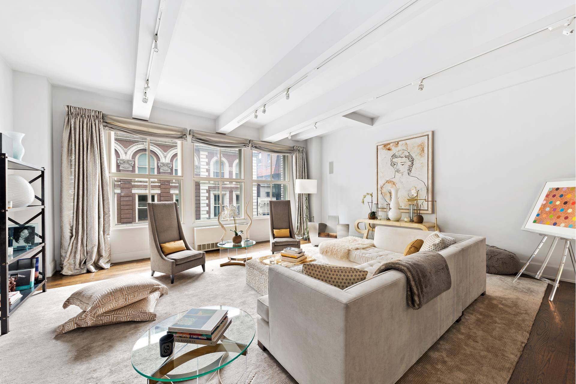 Exquisite duplex loft spanning approximately 2, 525 square feet of space offers 2 bedrooms, 2.