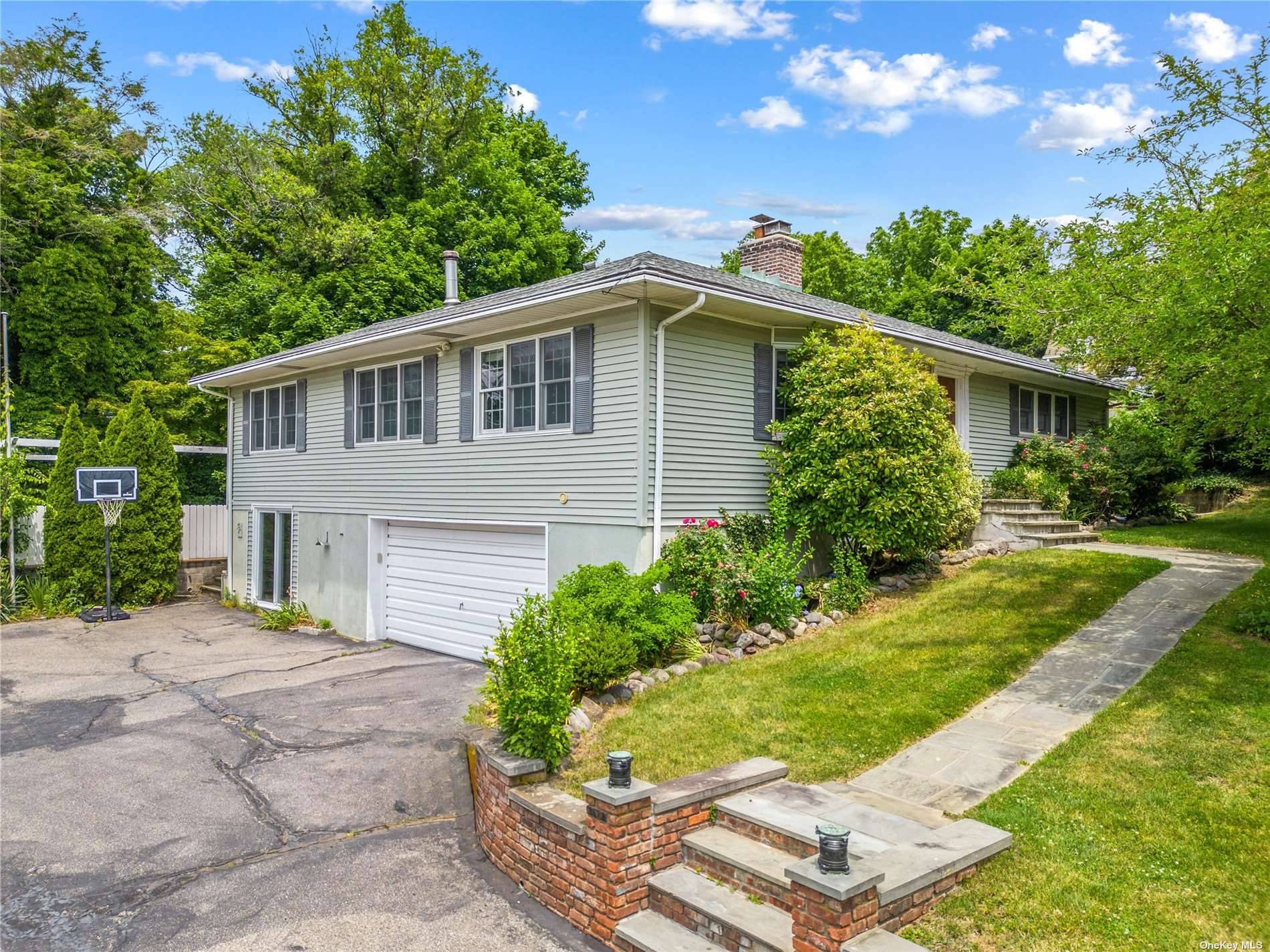 Experience the charm and elegance of this Hi Ranch property, Located In The North Shore School District and within close proximity to the beach and LIRR Glen head station.