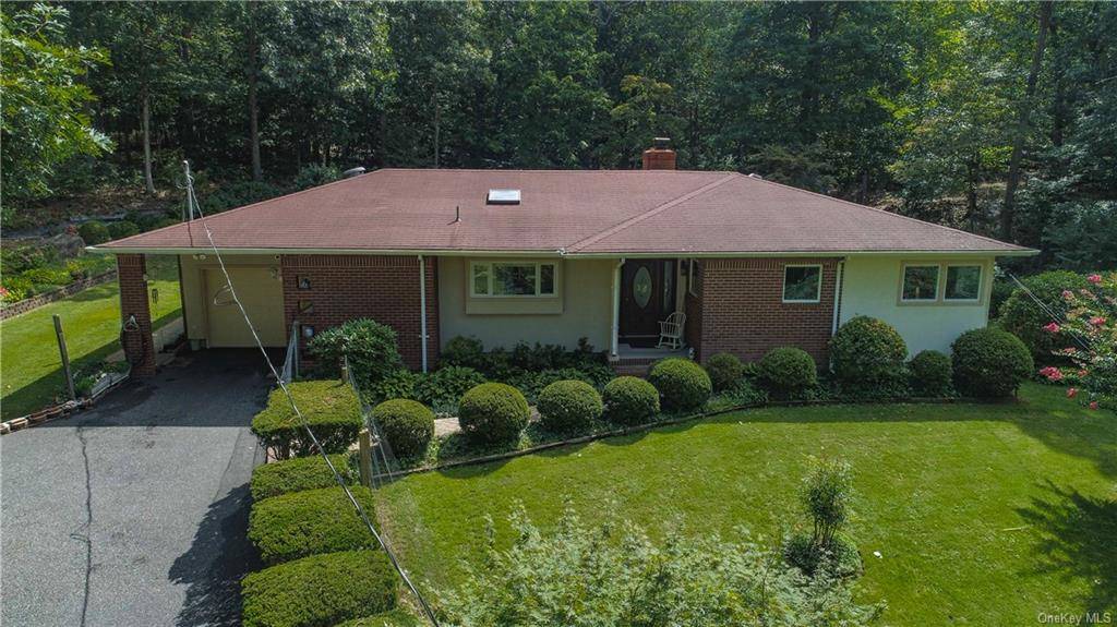 Beautifully Maintained Ranch On Private Elevated Corner That's Been Meticulously Maintained.