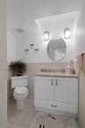 Guest bathroom is located in the hallway just across from bedroom 2