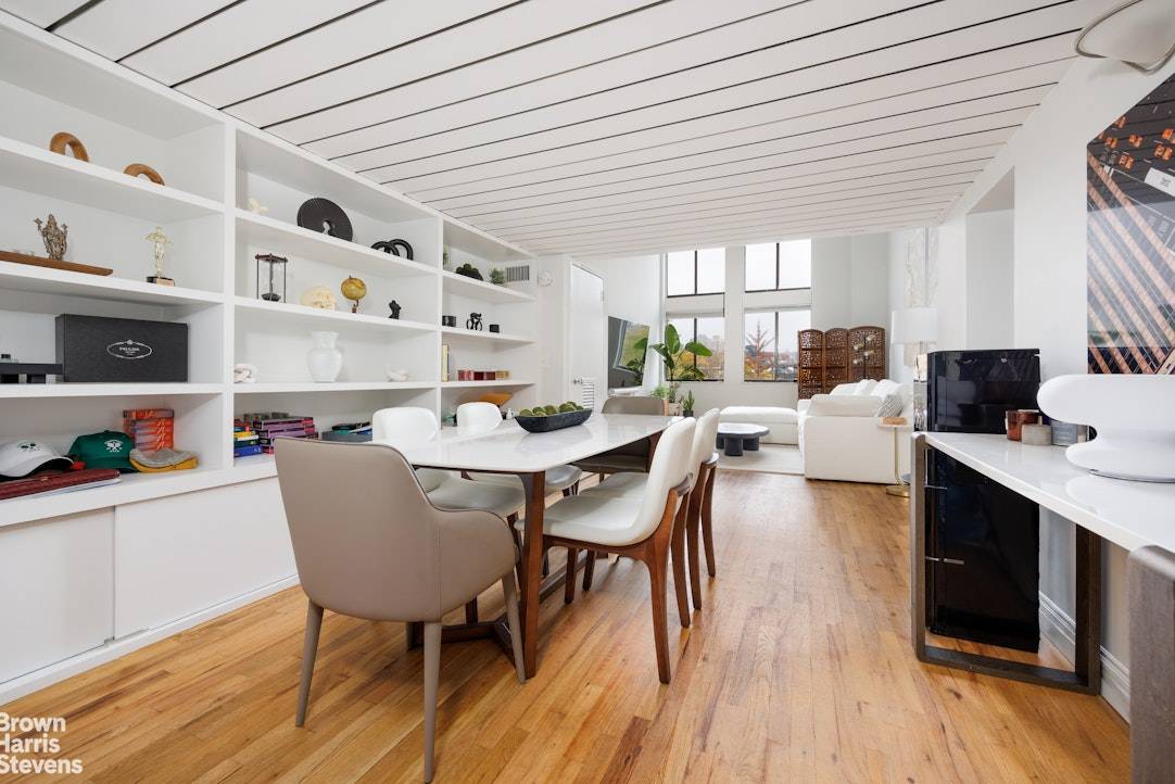 Classic duplex loft with open east exposures is a perfect start to describing this spacious and dramatic 1 bedroom, 1.