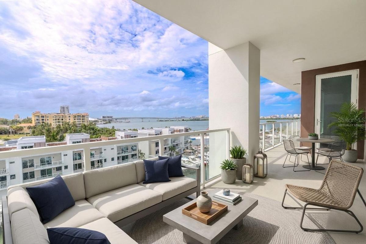 Perfect for morning coffee or evening cocktails, the balcony offers the ultimate setting to soak up the Gulf breeze and panoramic waterfront vistas. V