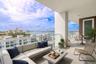 Perfect for morning coffee or evening cocktails, the balcony offers the ultimate setting to soak up the Gulf breeze and panoramic waterfront vistas. V