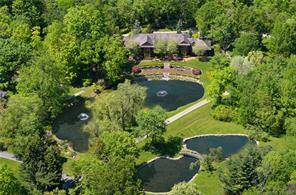 The one and only Alexander Julian Estate set on 29 pastoral acres with picturesque pond, gardens, tennis court, pool pool house, studio guest house, greenhouse, summer cottages, barn the masterful ...