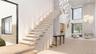 A floating staircase framed by custom wall detailing, soft illumination, and expansive glazing that draws in natural light from every angle.