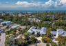 The Gulf in the background shows the convenient proximity, just a couple of blocks away on foot or by golf cart or bicycle which is the mode of transp