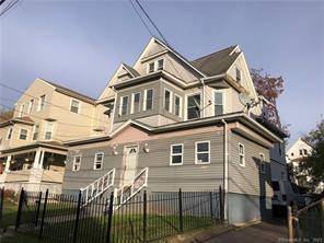 OVERSIZED 2 family with THREE UNIT potential located in a thriving neighborhood in the capital city.
