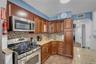 Granite kitchen with stainless steel appliances