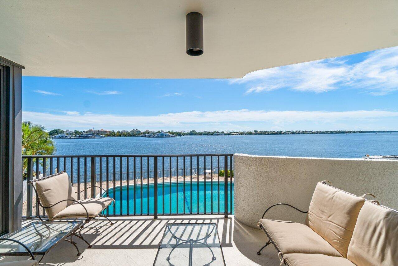 Waterfront condominium with stunning, panoramic views of the Intracoastal, Palm Beach and marina from all main rooms.