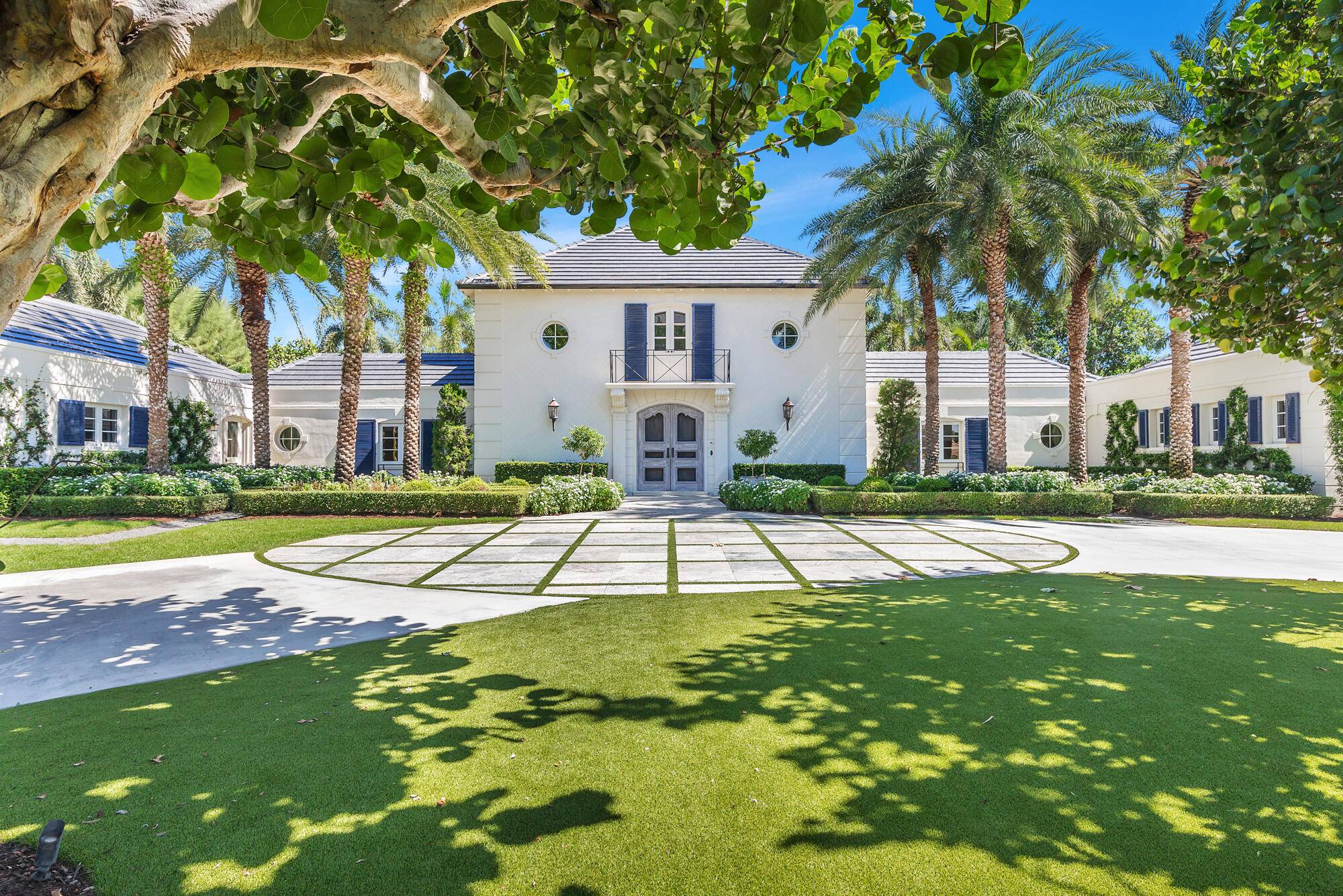 Exquisitely renovated traditional estate on almost a full acre in the heart of Gulf Stream.
