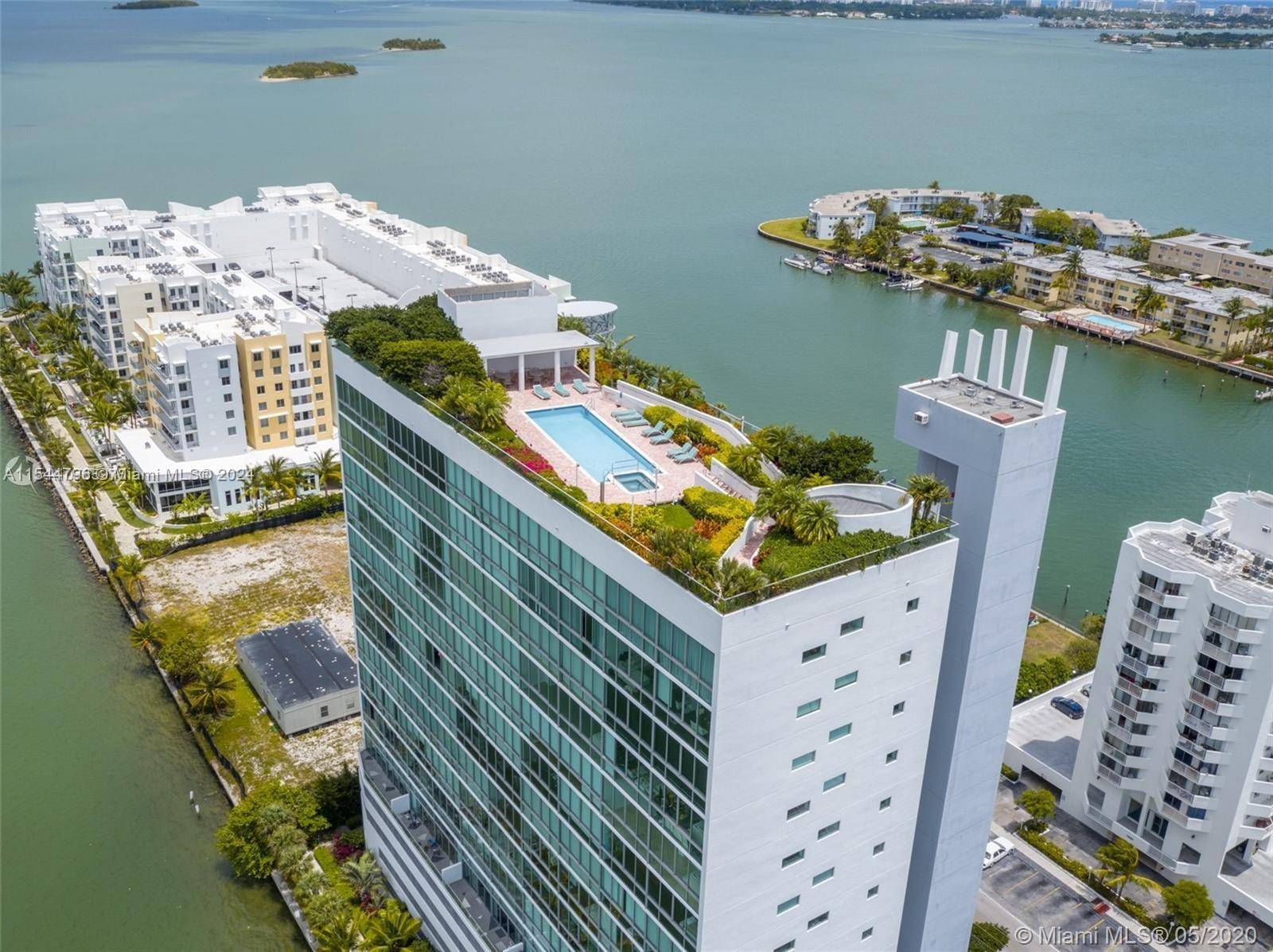 Embrace loft living in this sought after building with breathtaking bay views, dolphin sightings, and Miami's skyline.