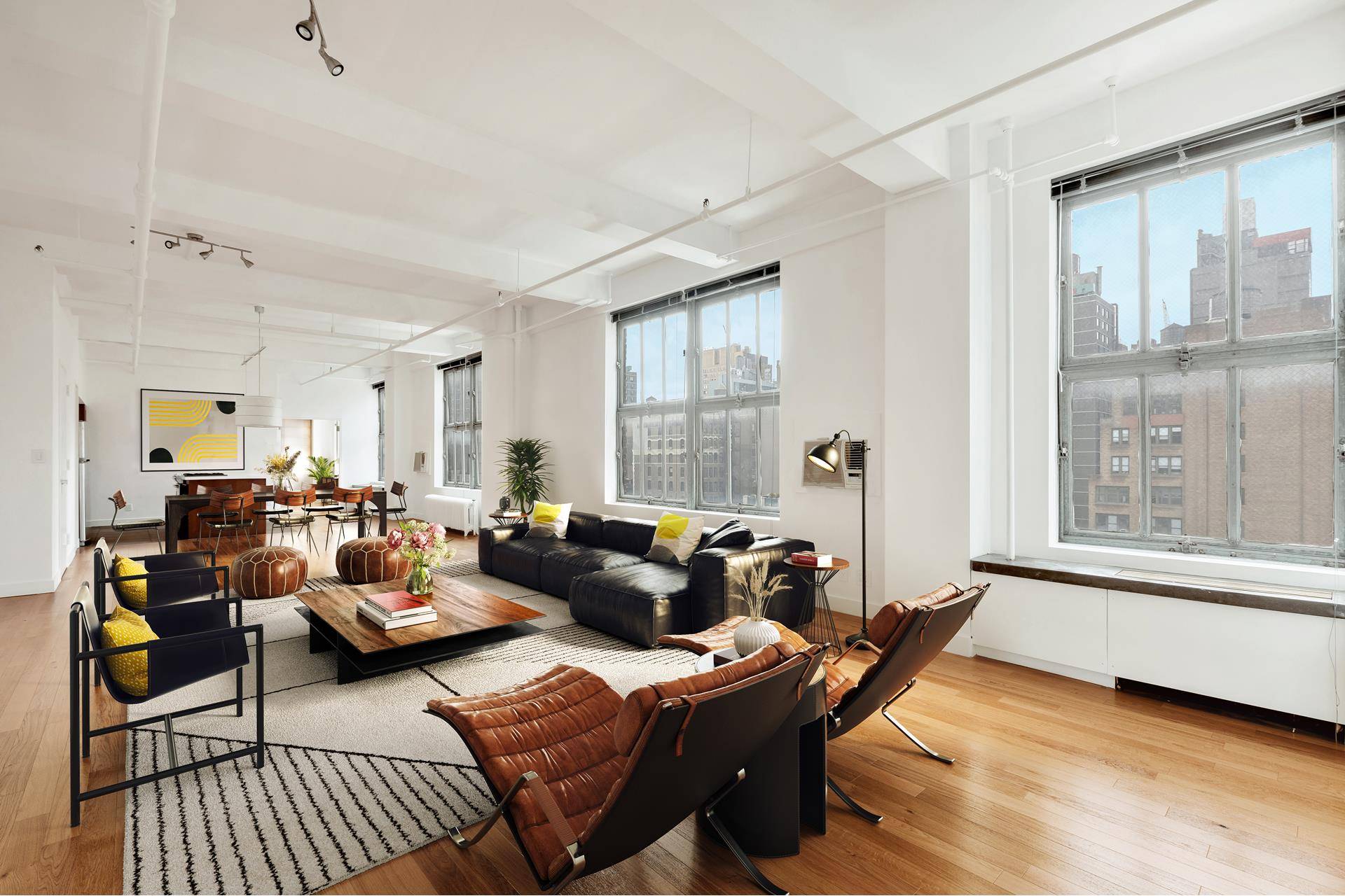 This airy 1, 875sf 3BR loft offers triple N S W exposures and soaring 10' 6 ?