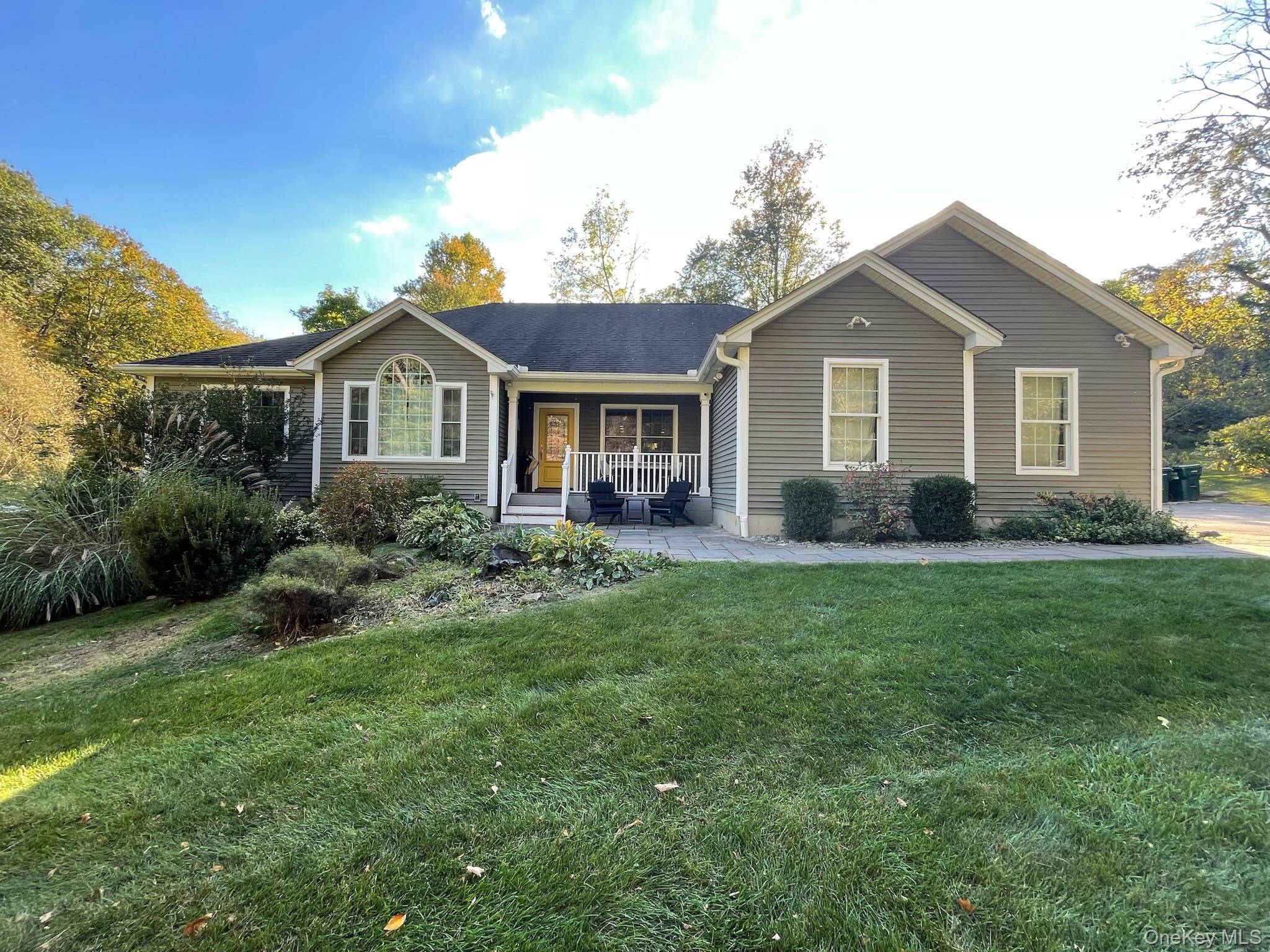 Nestled on a quiet 1 acre flag lot, this home offers the rare balance of peaceful seclusion and everyday convenience.