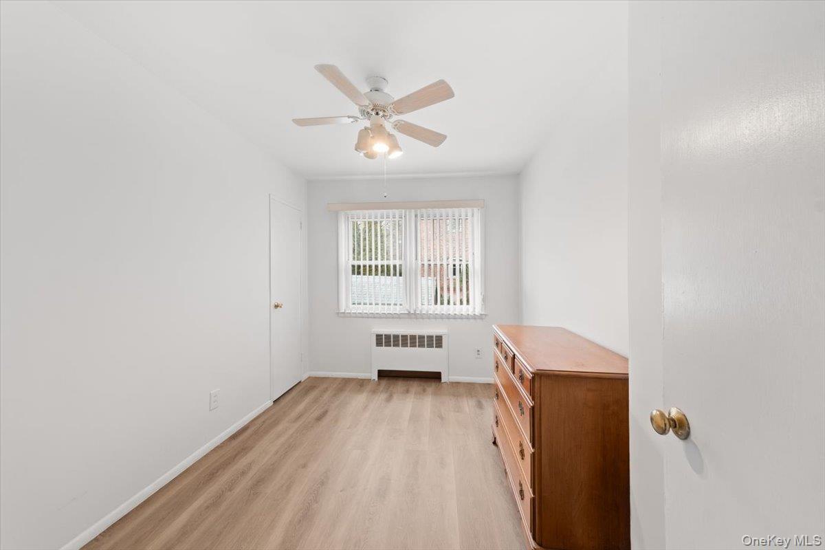 Spacious bedroom #3 with new luxury vinyl flooring and freshly painted.