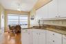 Kitchen lwith ample cupboards and storage