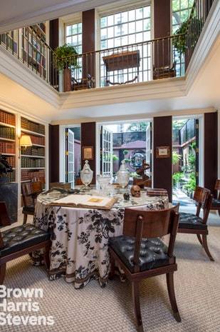 The discreet understated facade of this pristine 20 ft wide brownstone located in the heart of the upper East Side, conceals one of the most spectacular and elegant classical interiors ...