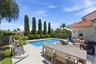 Resort-style backyard with pool at 2552 Sheltingham Drive Wellington FL rental