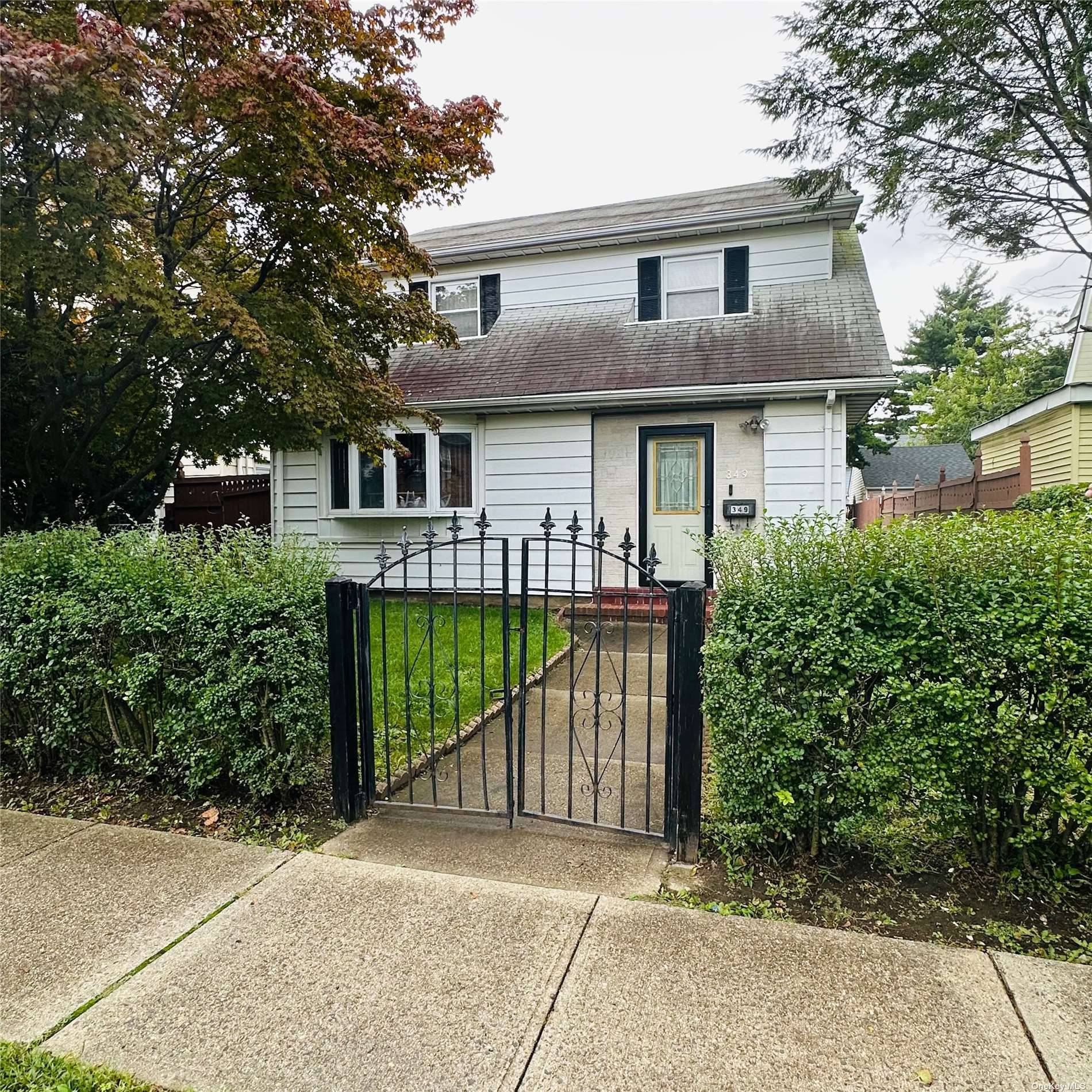 A Charming 3 Bedroom Colonial w finished basement, private entrance.