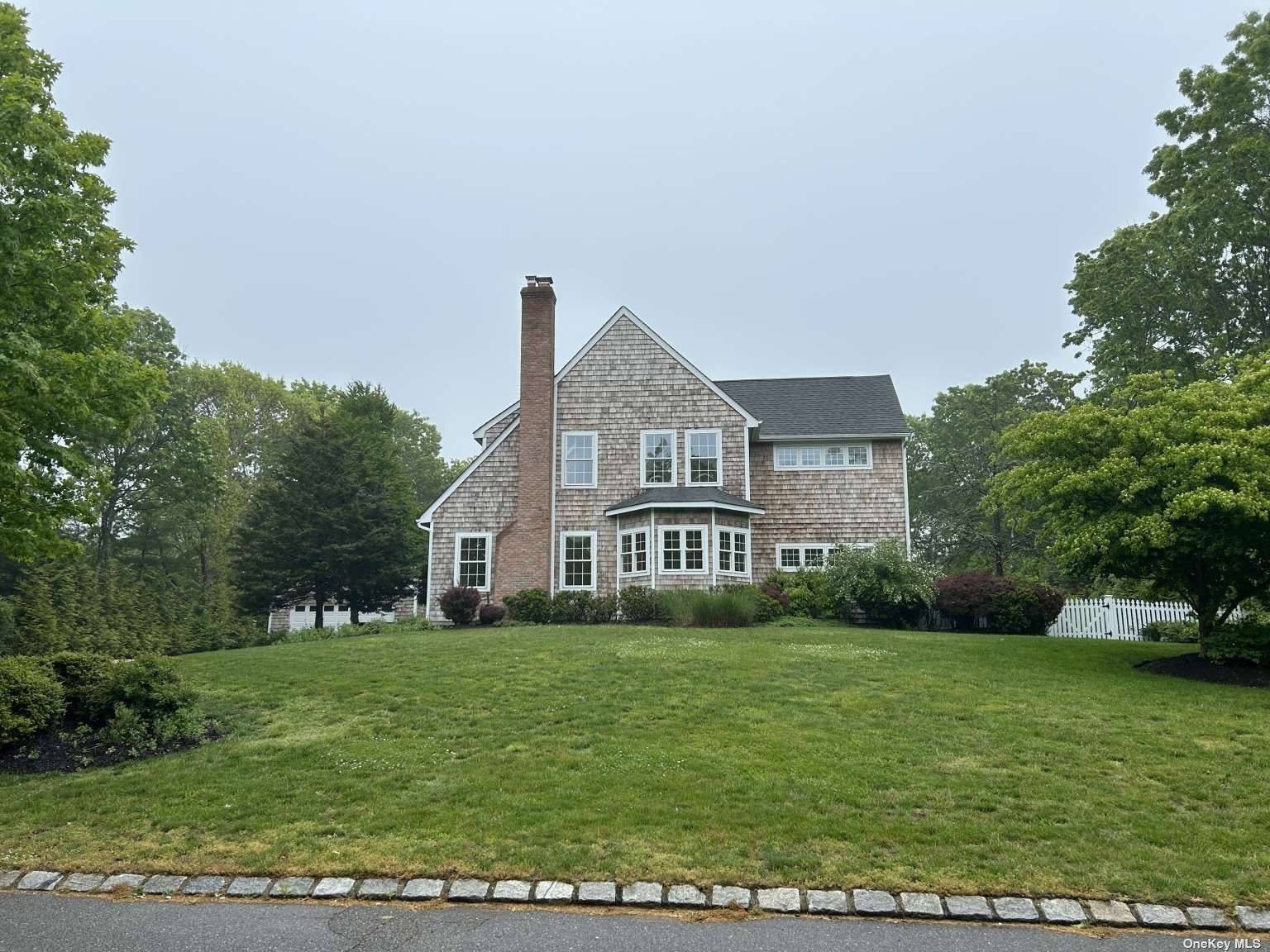 Southampton traditional turnkey sitting on a near 1 acre lot close to Southampton and Sag Harbor villages.