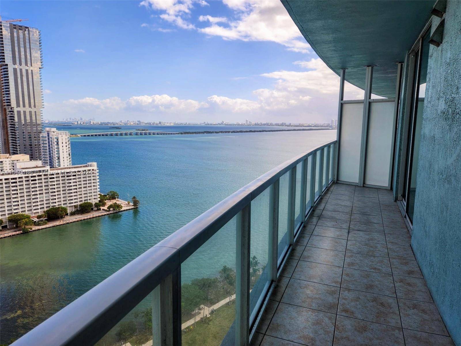 Embrace breathtaking sunrises and panoramic Bay views from this stunning convertible 2 bed, 1 bath unit, boasting a versatile den perfect for a 2nd bedroom or home office.