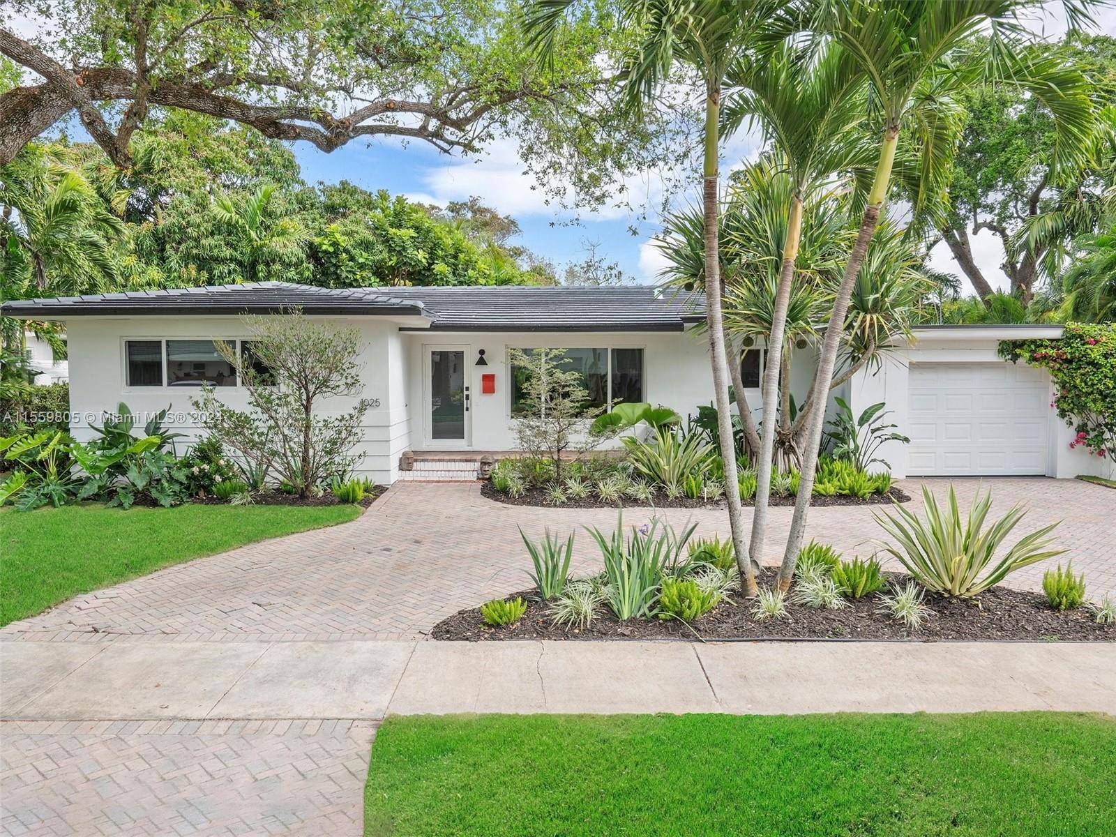 Welcome to your dream home located in East Miami Shores, a highly sought after Miami neighborhood which features 3 bedrooms plus a den office, 3 full bathrooms, high ceilings, impact ...