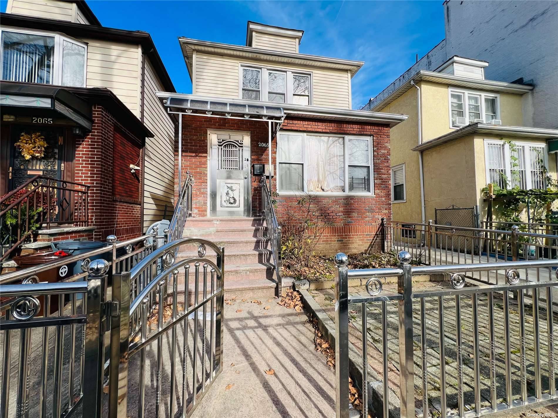 Beautiful well maintained two family house with garage in Bensonhurst.