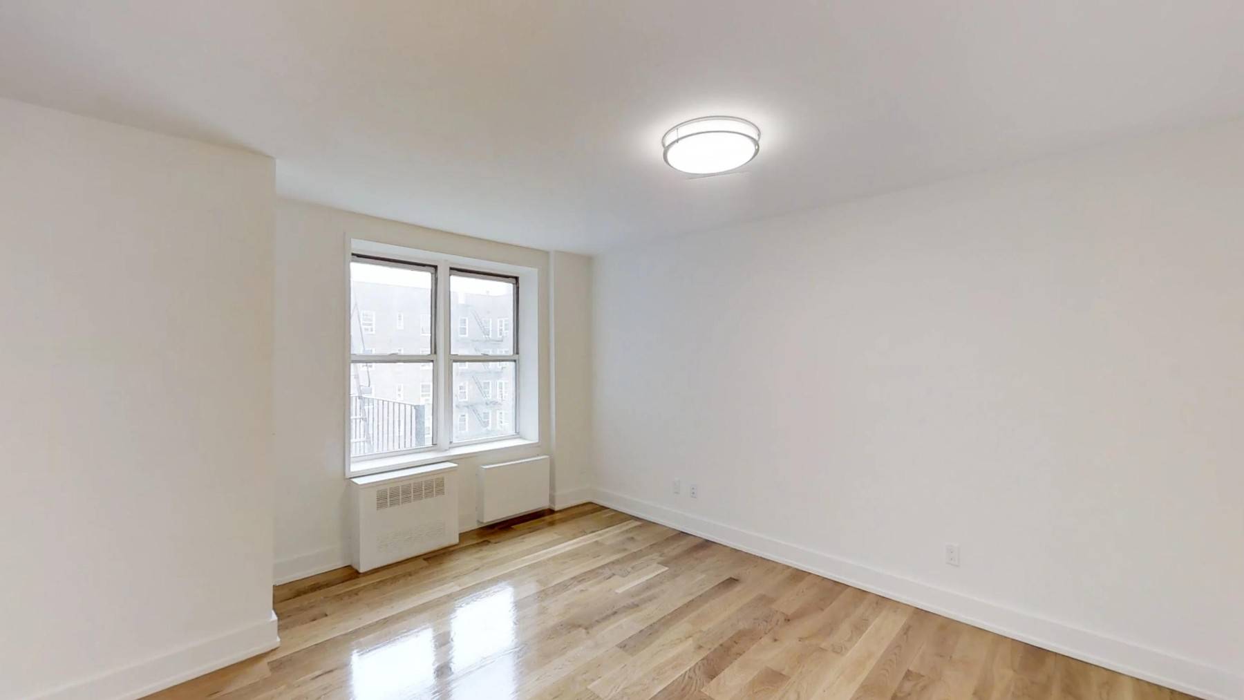 This modern, gut renovated one bedroom apartment features new oak hardwood floors, a large living room, separate kitchen with stainless steel appliances and a glass tiled back splash, sparkling new ...