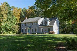 This beautiful colonial home has a spacious open floor plan !