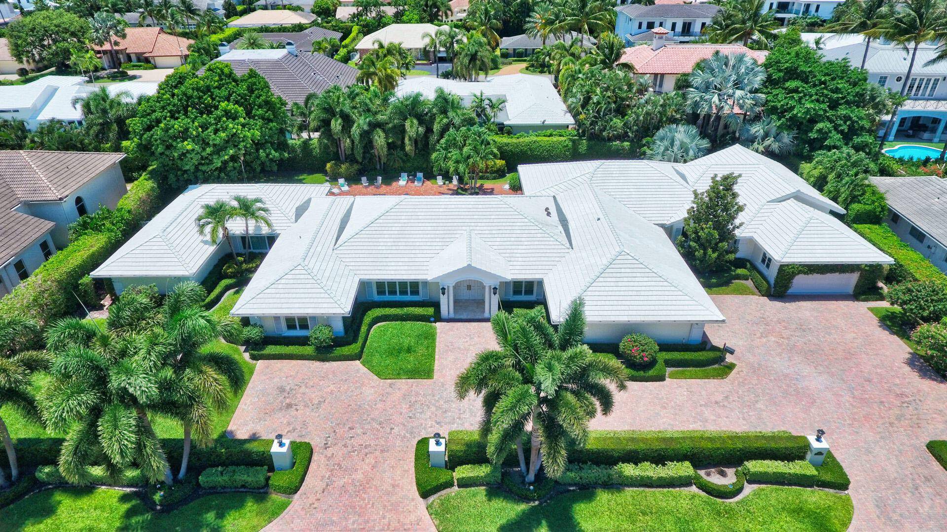 Rare opportunity to own a double lot on a quiet street in Boca Raton's most prestigious community, Royal Palm Yacht Country Club !